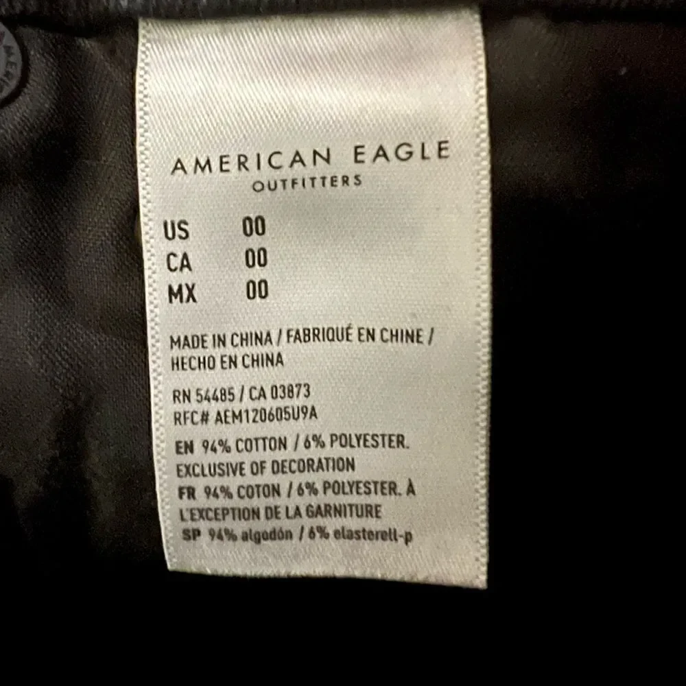 American Eagle black button up denim jean mini skirt with pockets 00